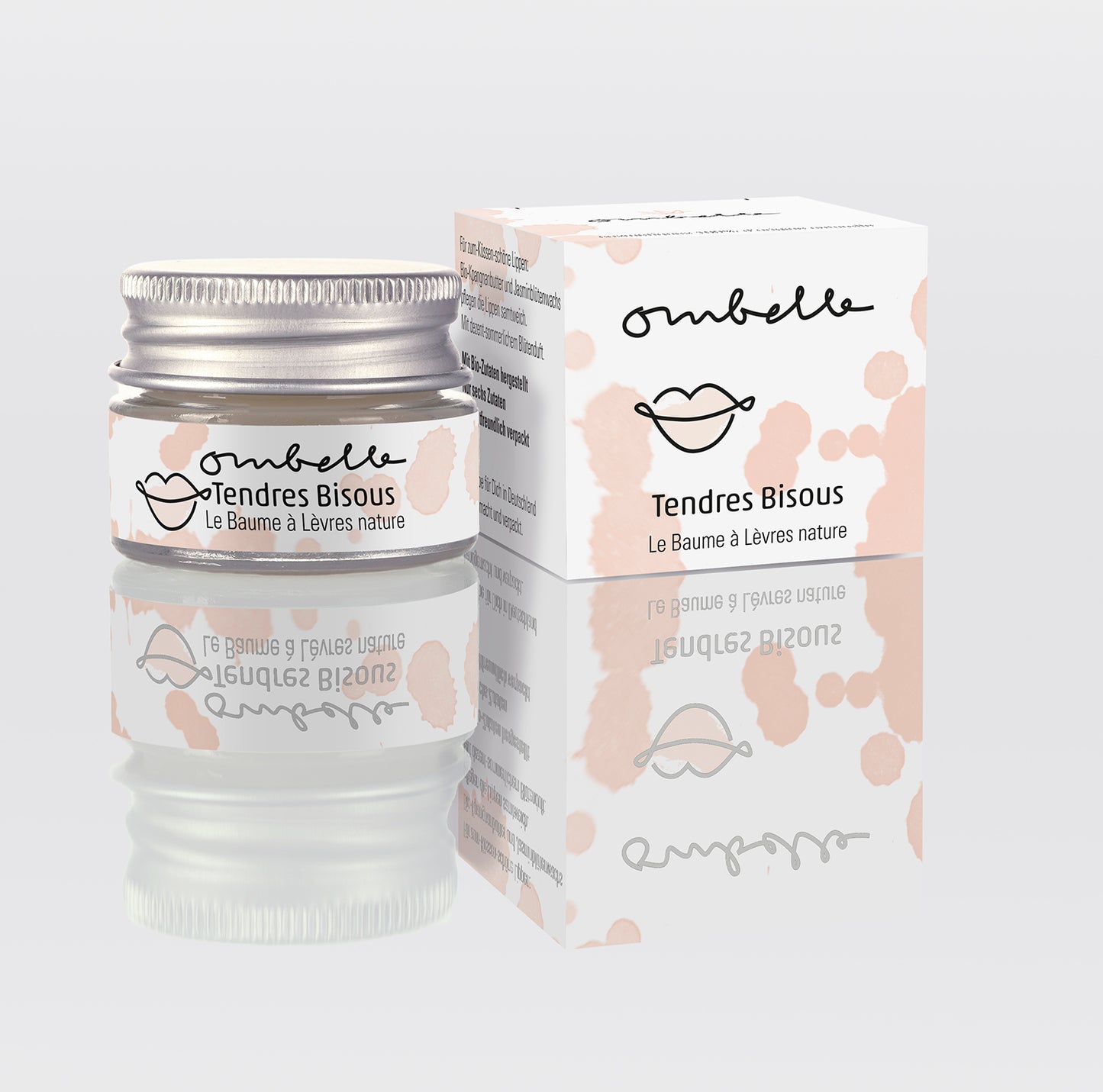 Ombelle Tendres Bisous Lippenbalsam 5g im Glastiegel mit Metalldeckelmit natürlichem Blütenwachs. Daneben ist das Foto von dem Faltschachtel.