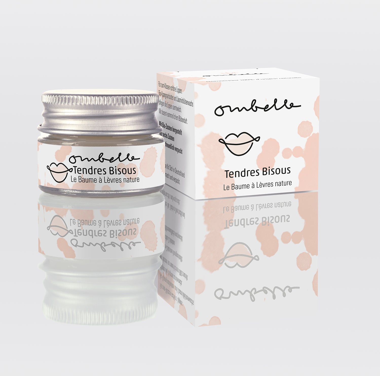 Ombelle Tendres Bisous Lippenbalsam 5g im Glastiegel mit Metalldeckelmit natürlichem Blütenwachs. Daneben ist das Foto von dem Faltschachtel.